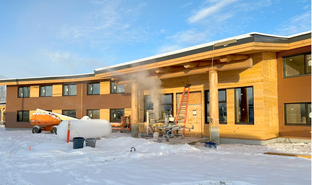 Daylu Dena civic building: a construction site in winter.