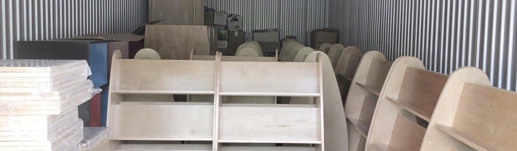 At the ''distribution centre'' in Nanaimo, shelves made at Nanaimo Correctional Centre await installation in the next library. Nanaimo Correctional Centre's ongoing support put it among the Write to Read BC sponsors.
