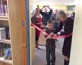Cutting the ribbon at Nisaika Kum’Tuks Elementary Centre.