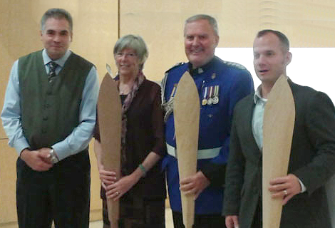 Ceremonial paddles given to lieutenant-governor of BC Judy Guichon, her principal secretary Jamie Hammond, and Christoph Neufeld of Britco Structures.